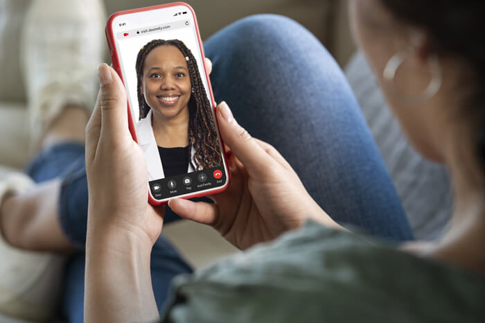 Doximity video visit with TrueCare provider on phone