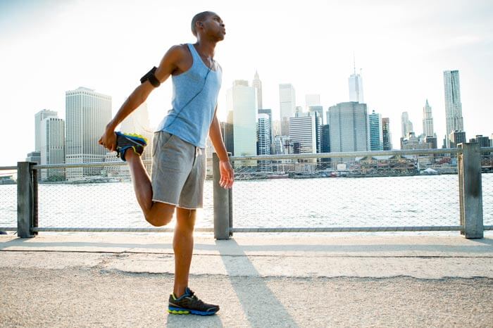 truecare-exercise-mental-health-featured-image-blog-700×466 Man stretching in New York getting ready for a run