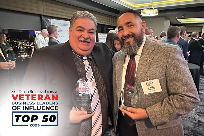 Veteran Leaders of Influence holding awards